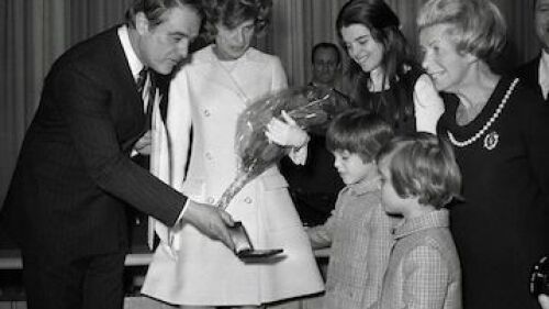 Sargent Shriver Showing Medal to His Children